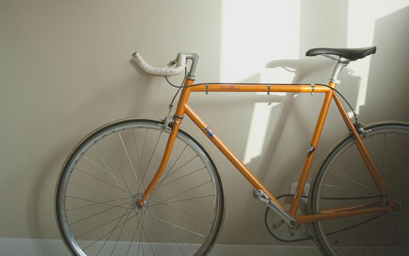 a bicycle parked in a room