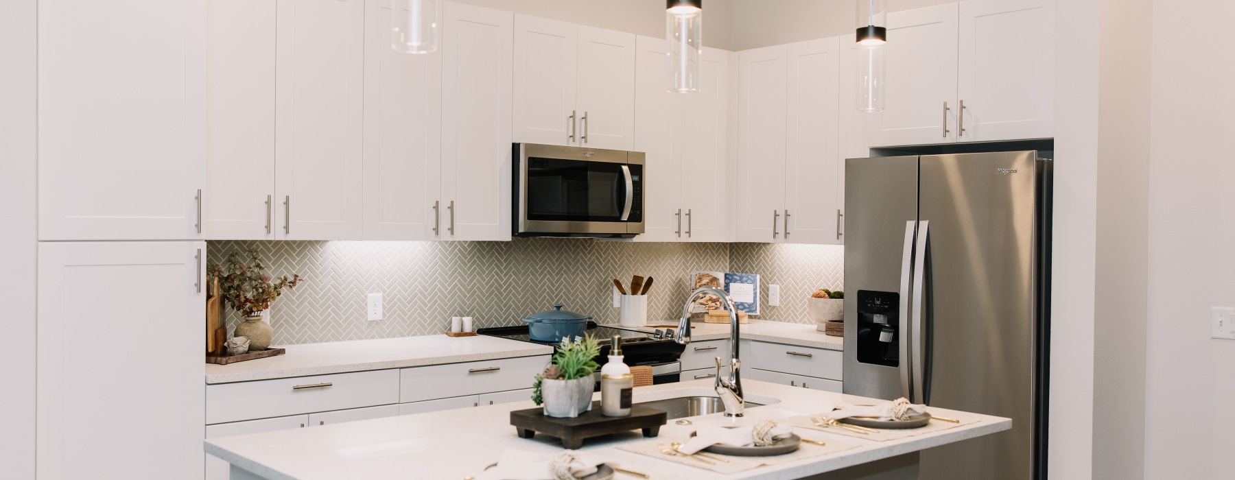 kitchen in the cool scheme at The Harden senior apartments in fort worth