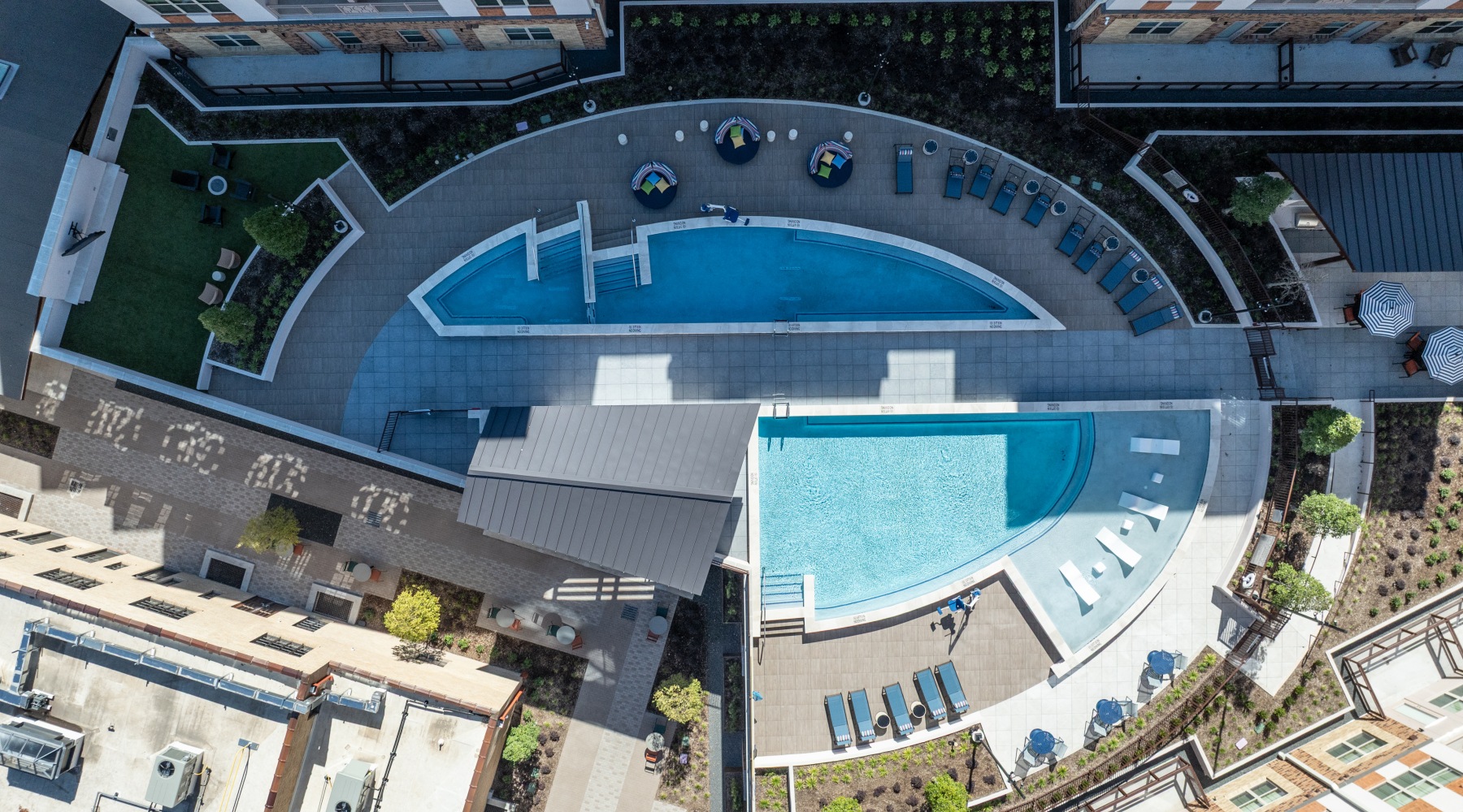 An aerial view of the pool deck at The Harden - active senior apartments in Fort Worth
