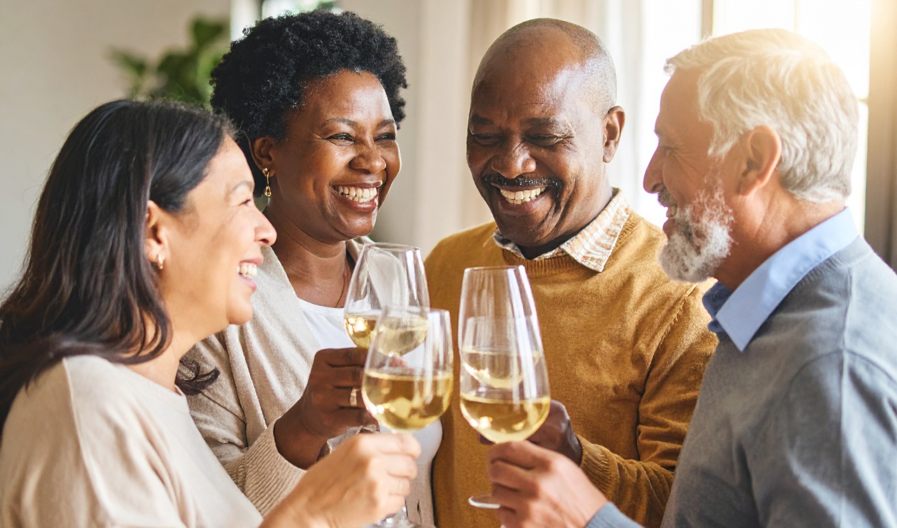 Two couples drinking wine at The Harden at Public Market